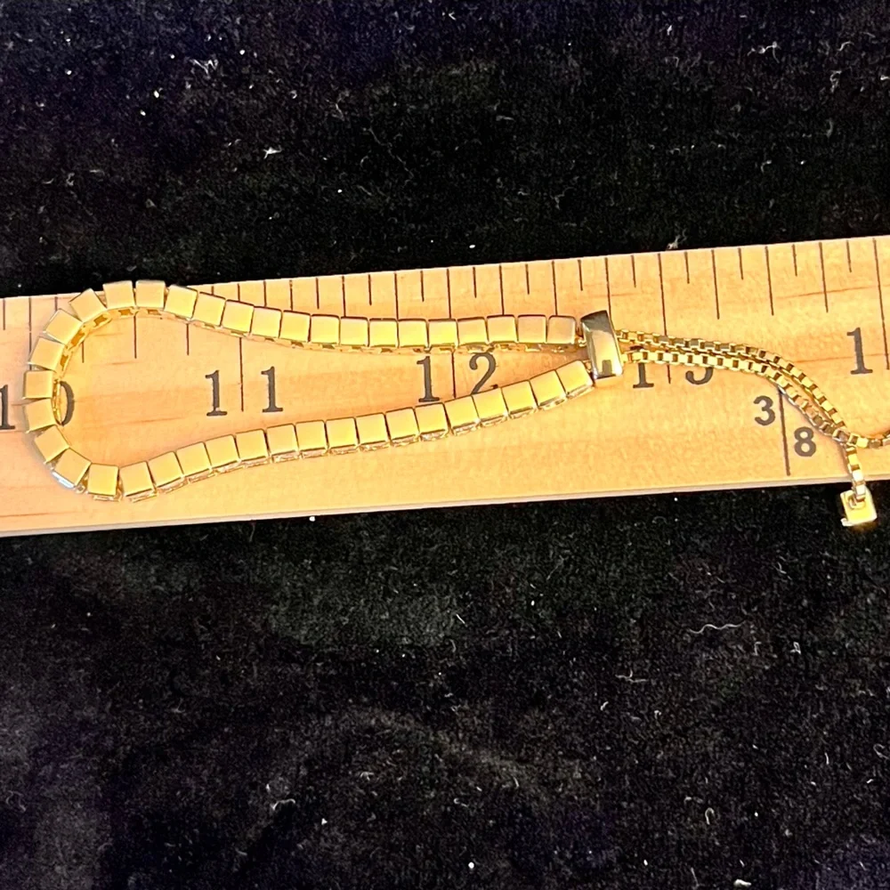 Premier Designs
Gold Color Rhinestone Adjustable Tennis Bracelet Fringe Gift VTG - Picture 17 of 17